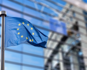 The European Union flag outside of a building