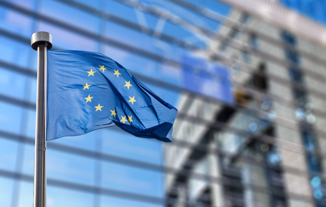 The European Union flag outside of a building