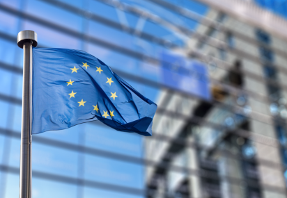 The European Union flag outside of a building